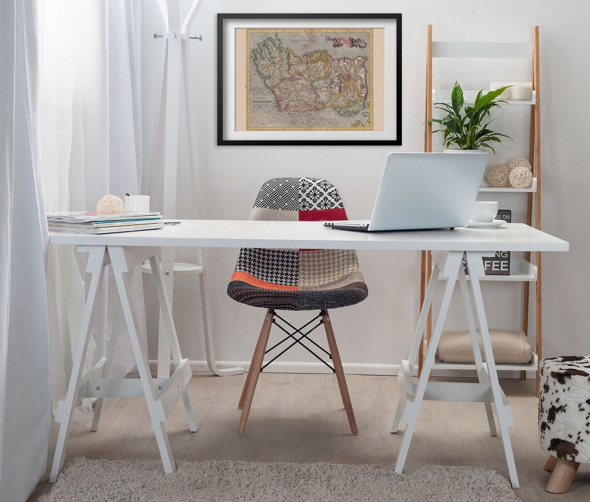 Ireland 1620 Map print framed above a white desk in a home office