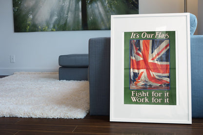 Its Our Flag Fight for It Work for It poster leaning beside a blue sofa