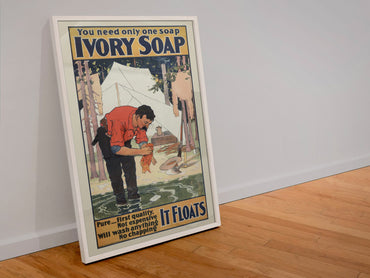 Ivory Soap — It Floats poster in a white frame leaning against a wall
