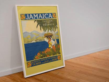 Jamaica Gem of the Tropics poster in a white frame leaning against a wall