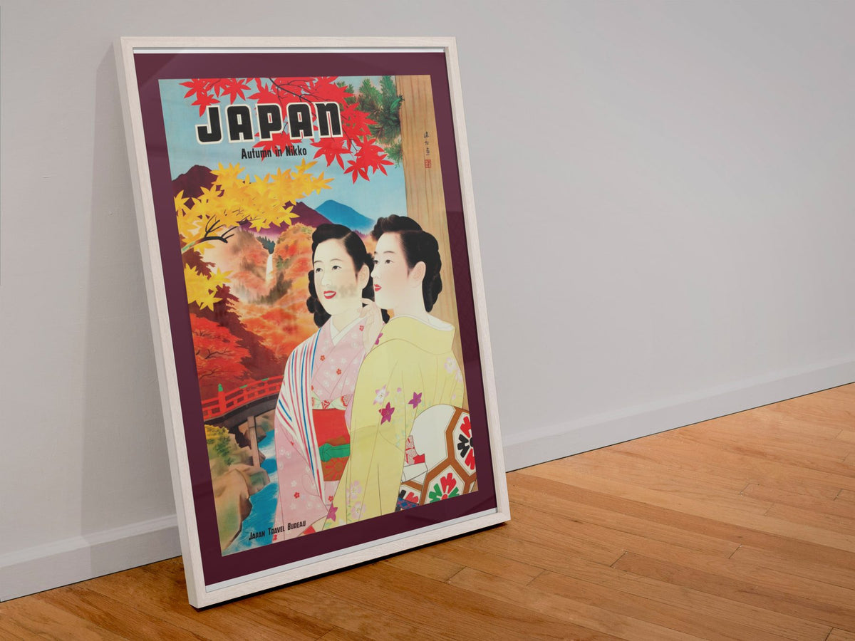 Japan Autumn poster in a white frame leaning against a wall