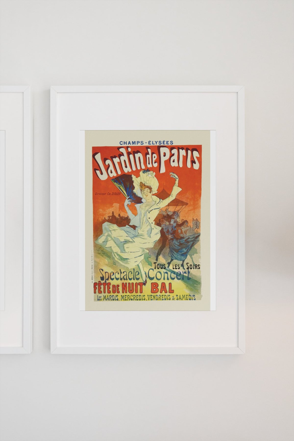 Jardin de Paris 1897 poster in a white frame on a light wall