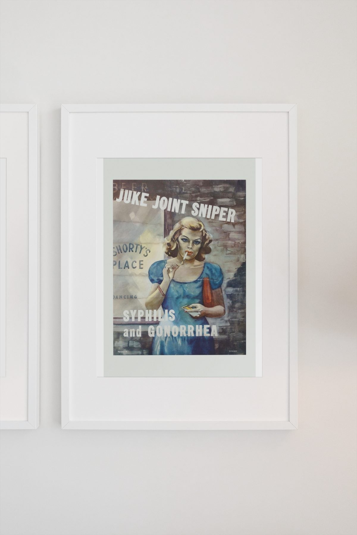 Juke Joint Sniper poster on a light wall