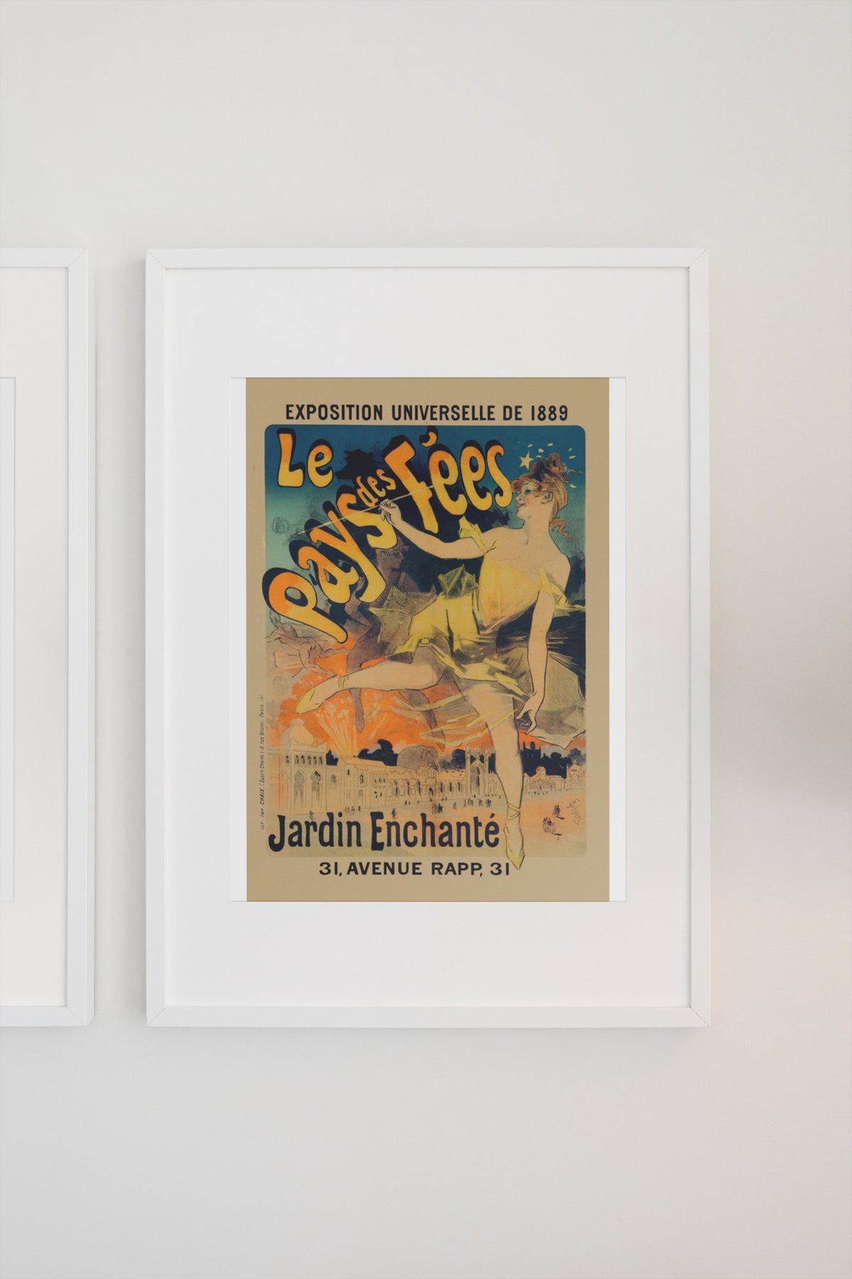 Jules Chéret Le Pays des Fées poster in a white frame on a light wall