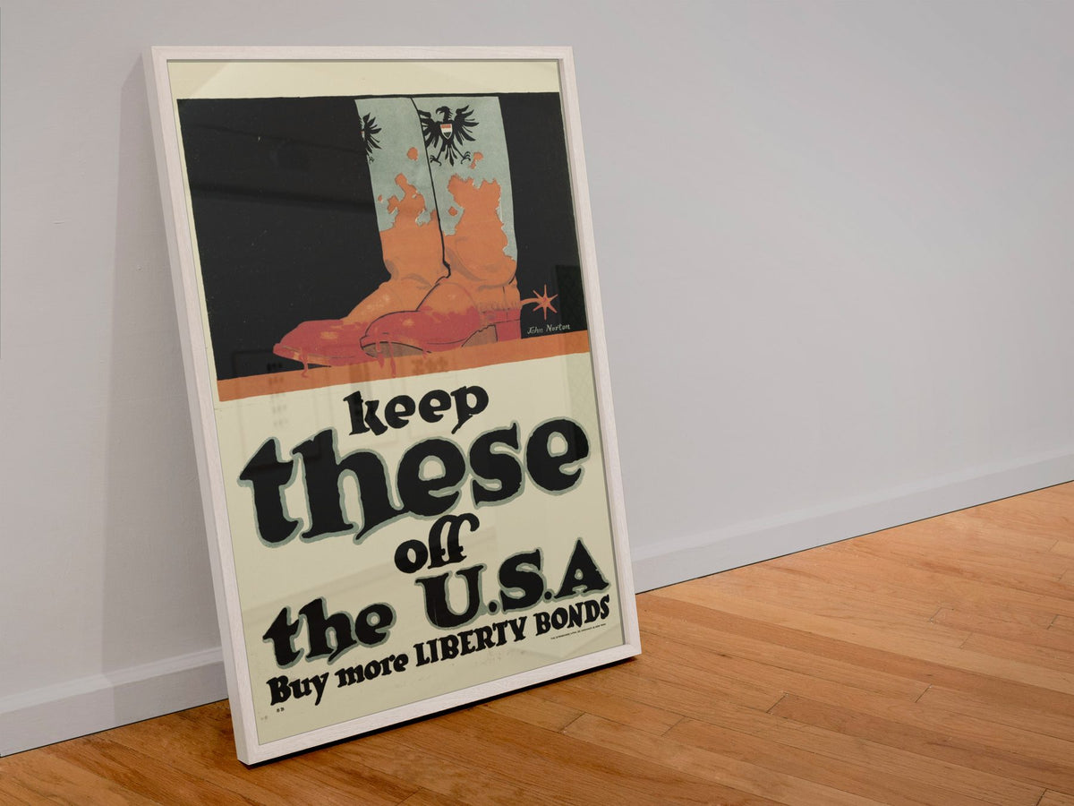 Keep These Off the U.S.A. poster in a white frame leaning against a wall