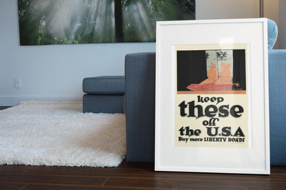 Keep These Off the U.S.A. poster leaning beside a blue sofa