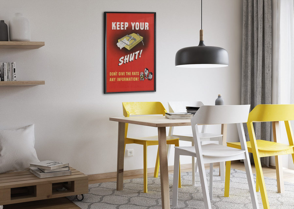 Keep Your Trap Shut poster framed above a dining table