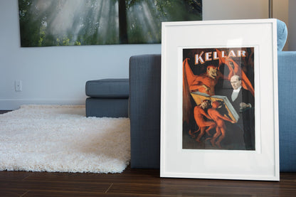 Kellar Reads With the Devil poster leaning beside a blue sofa