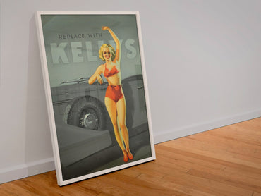 Kelly-Springfield Tires Pin-Up poster in a white frame leaning against a wall