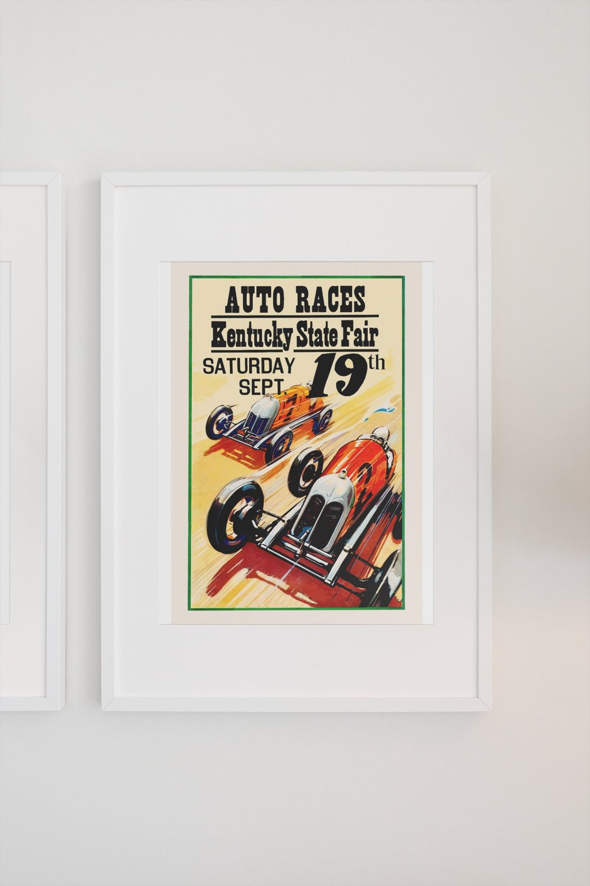 Kentucky State Fair Auto Races poster in a white frame on a light wall