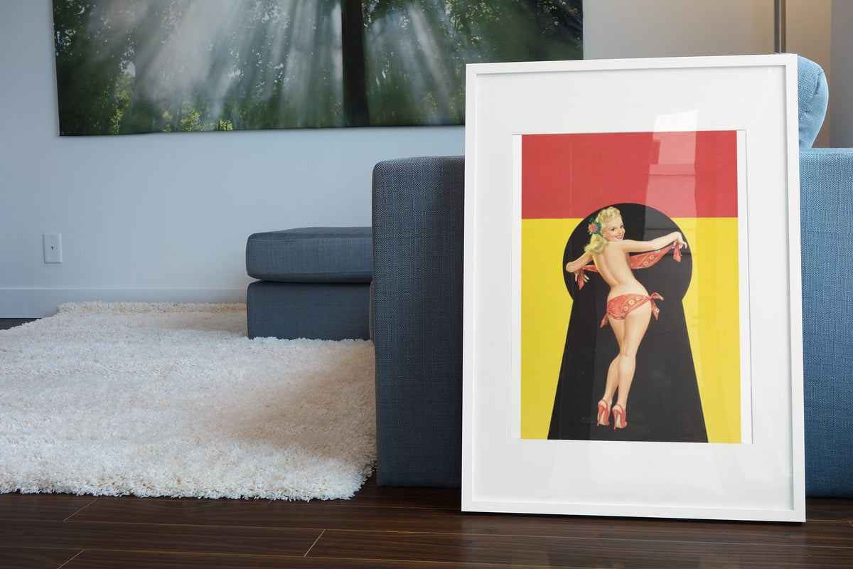 Keyhole Bandana poster leaning beside a blue sofa