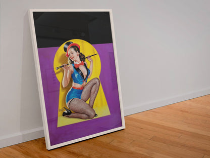 Keyhole Dancer poster in a white frame leaning against a wall