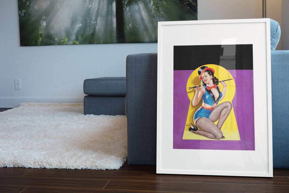 Keyhole Dancer poster leaning beside a blue sofa