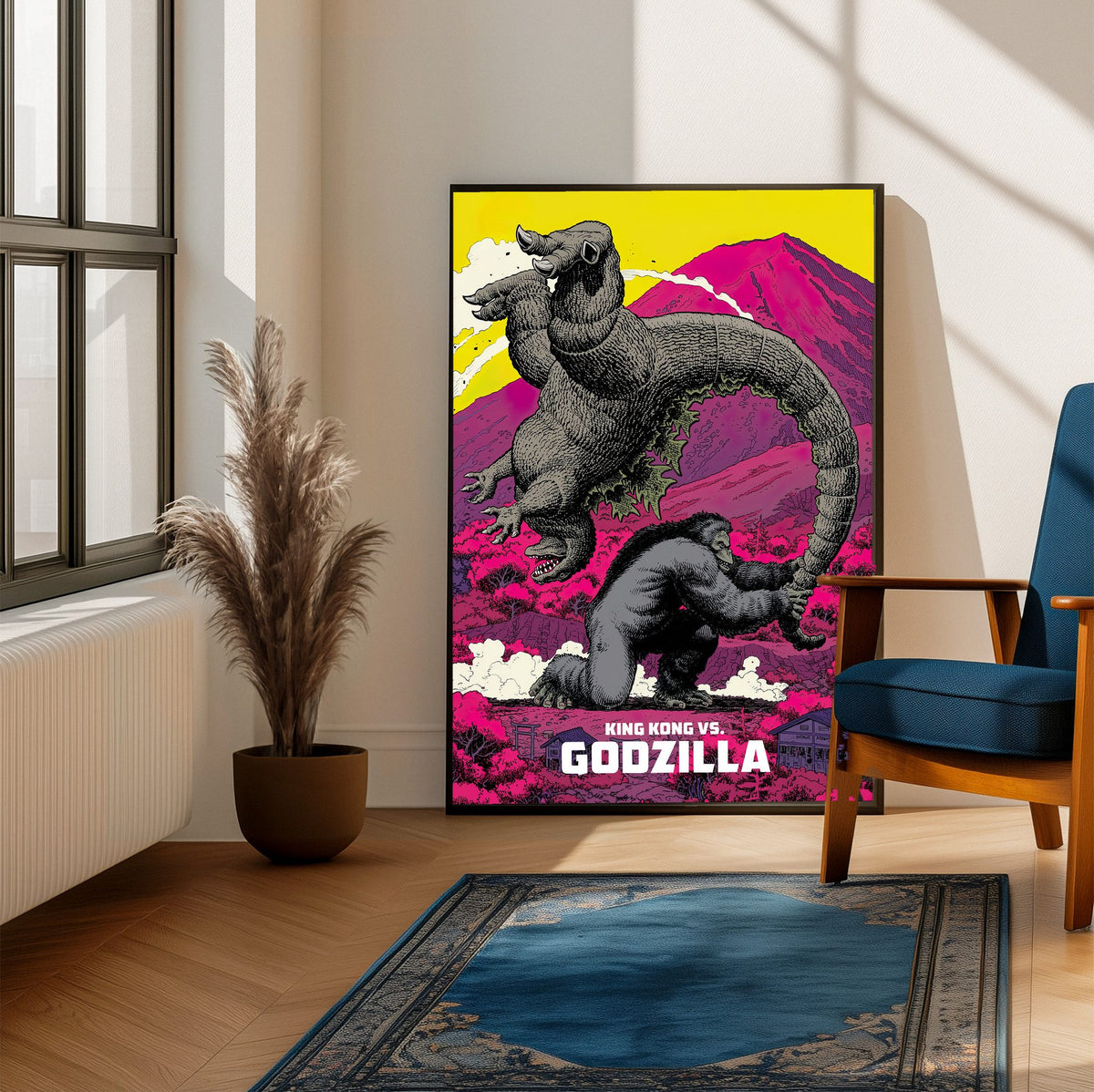 King Kong vs. Godzilla (1962) Movie Pop Art poster framed beside a blue armchair in a sunlit room