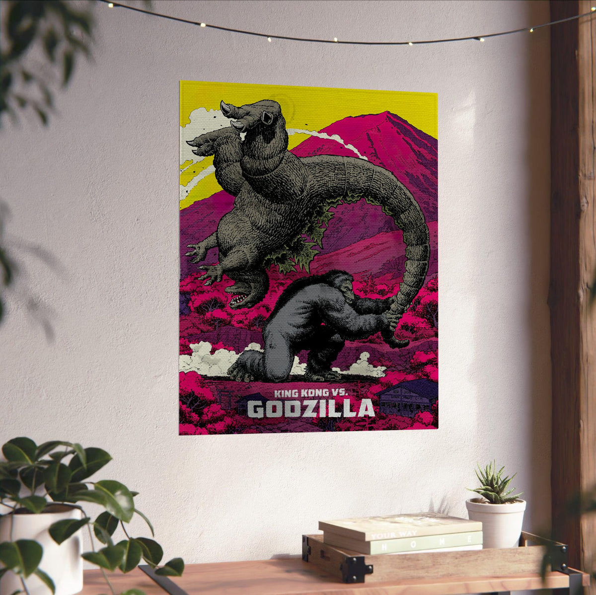 King Kong vs. Godzilla (1962) Movie Pop Art poster unframed on a white wall above a desk