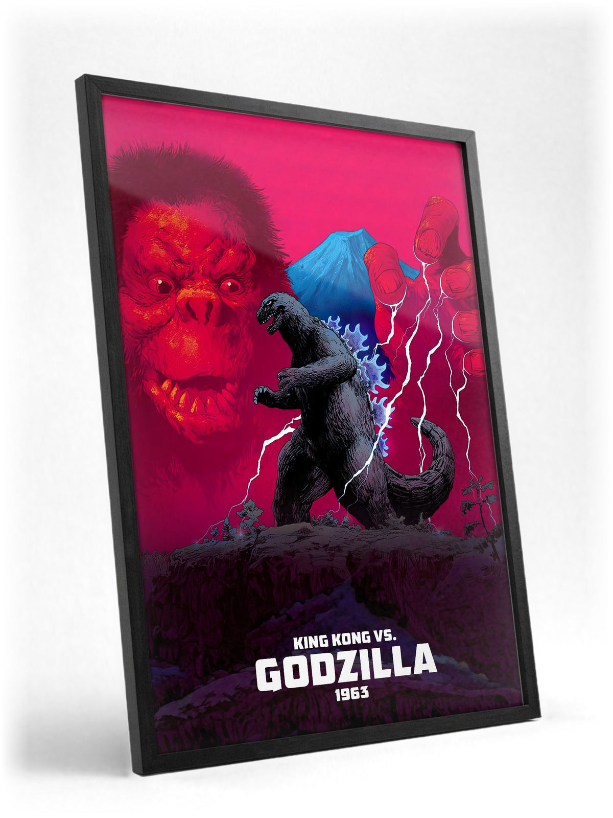 King Kong vs. Godzilla (1963) Movie Red Pop Art poster in a black frame with glass leaning against a wall