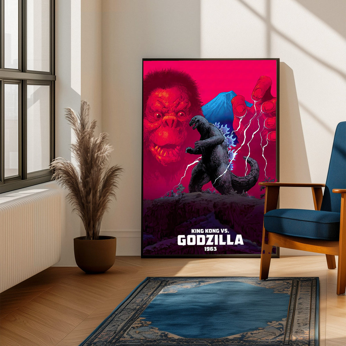 King Kong vs. Godzilla (1963) Movie Red Pop Art poster framed beside a blue armchair in a sunlit room