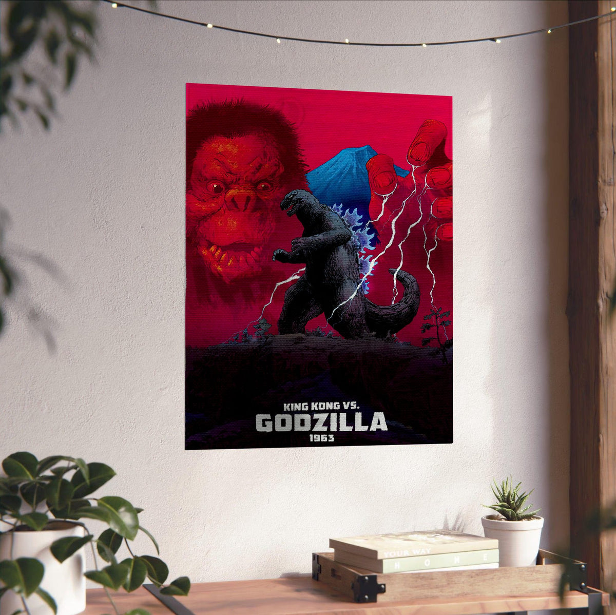 King Kong vs. Godzilla (1963) Movie Red Pop Art poster unframed on a white wall above a desk