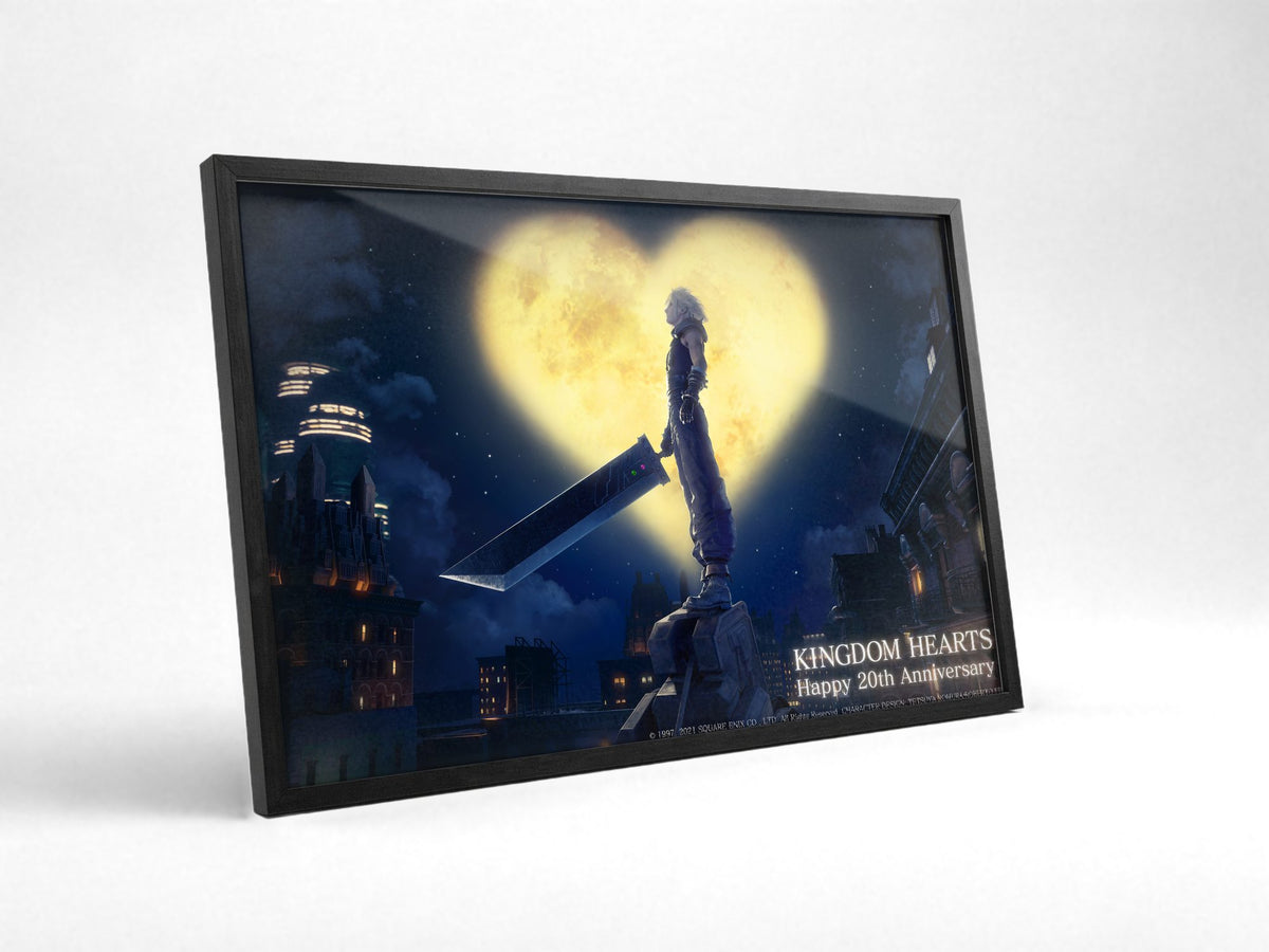 Kingdom Hearts 20th Anniversary Art poster in a black frame with glass leaning against a wall