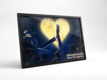 Kingdom Hearts 20th Anniversary Art poster in a black frame with glass leaning against a wall