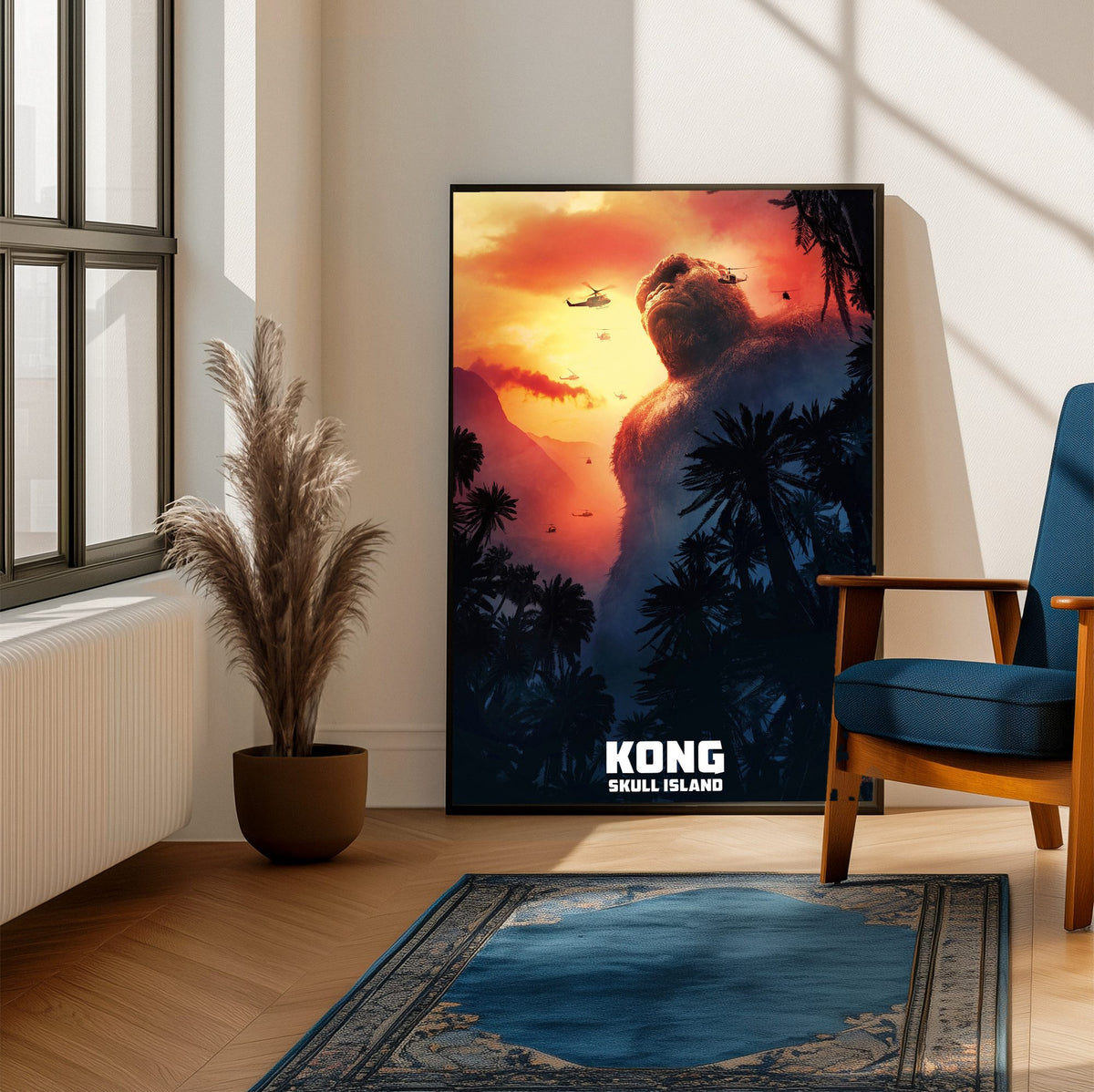 Kong: Skull Island (2017) Movie Key Art poster framed beside a blue armchair in a sunlit room