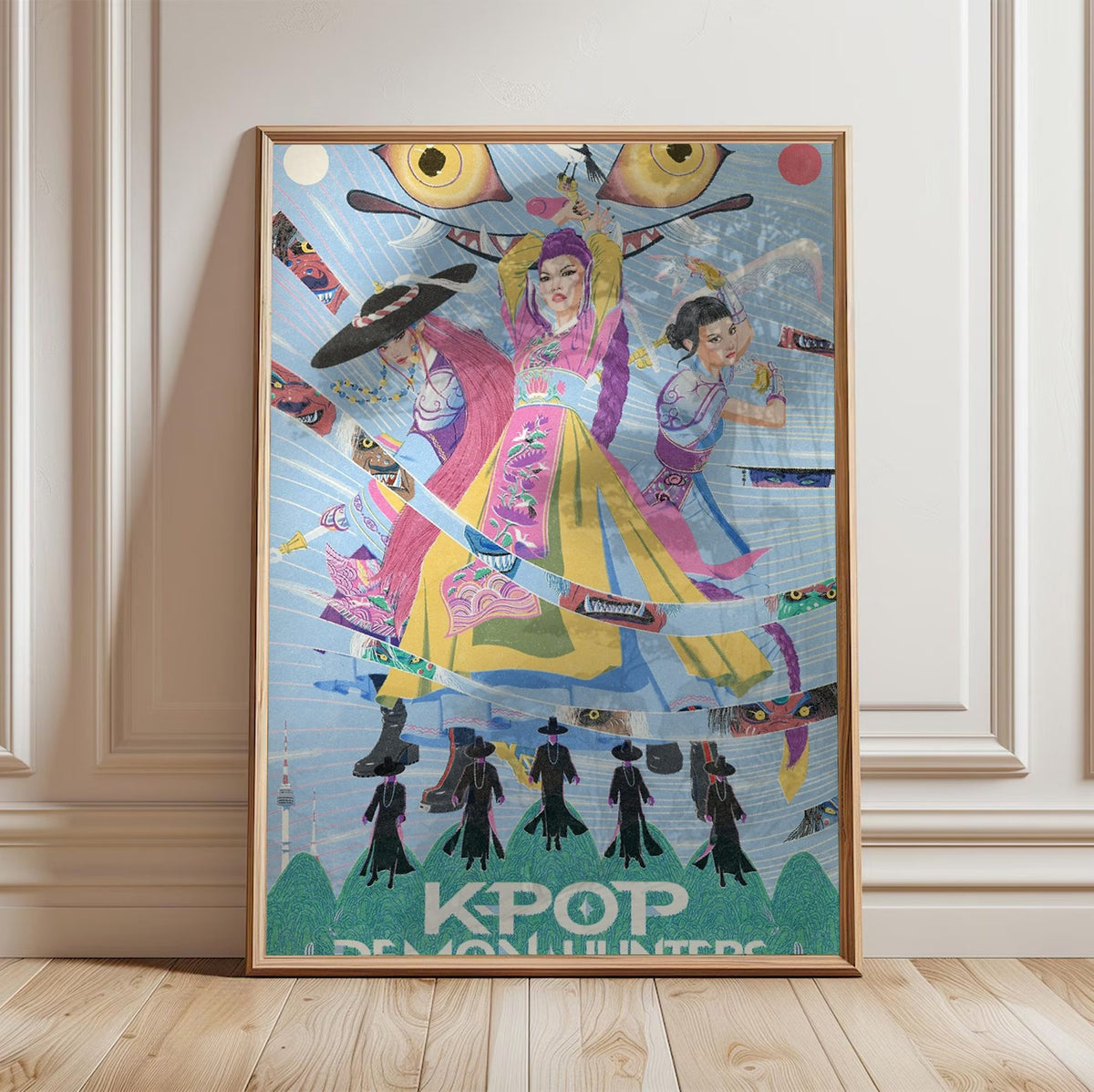 KPop Demon Hunters (2025) Movie Folk Art Illustrated poster in a light oak frame leaning against a white wall