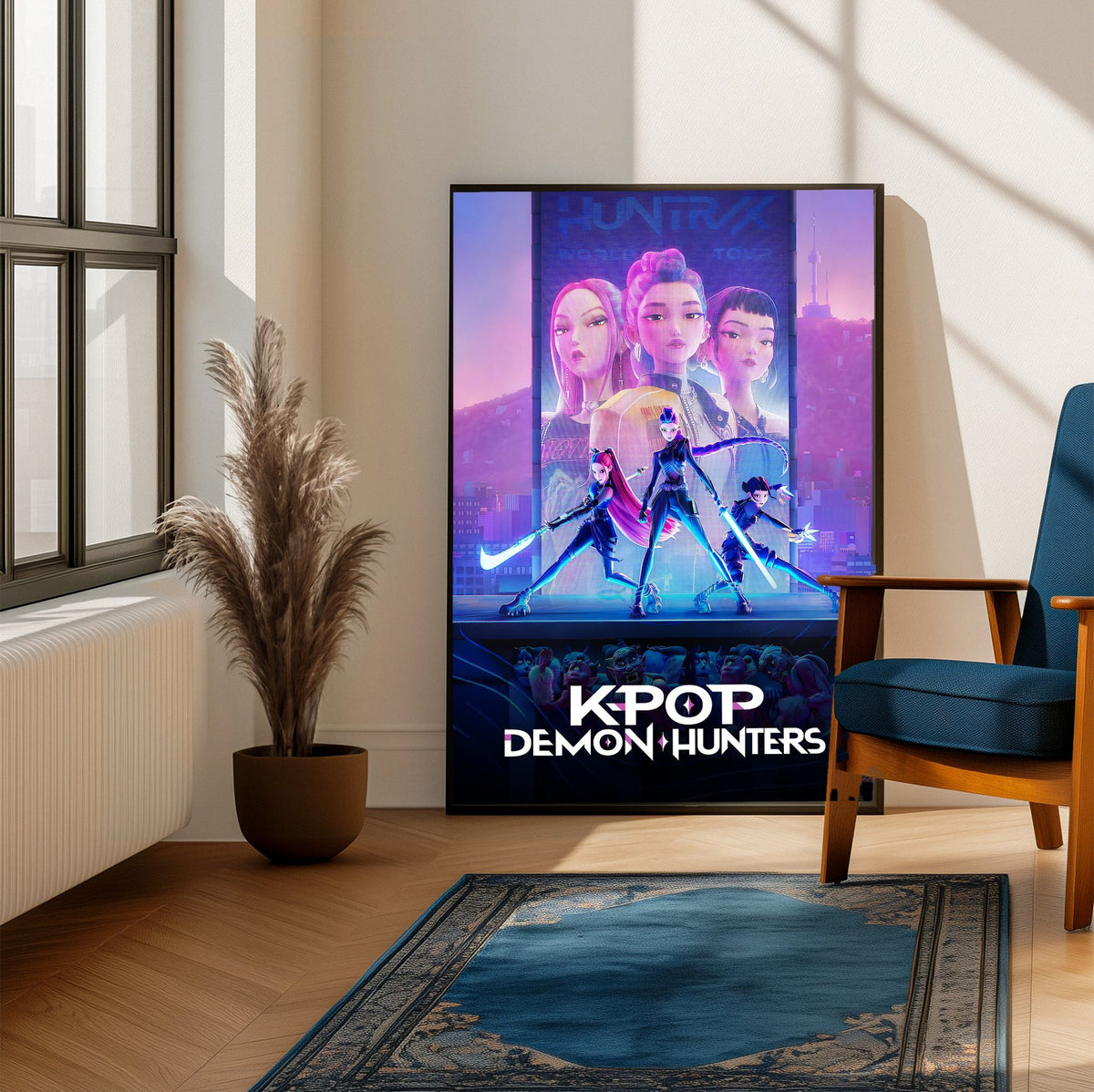 KPop Demon Hunters (2025) Movie Huntrix Key Art poster framed beside a blue armchair in a sunlit room