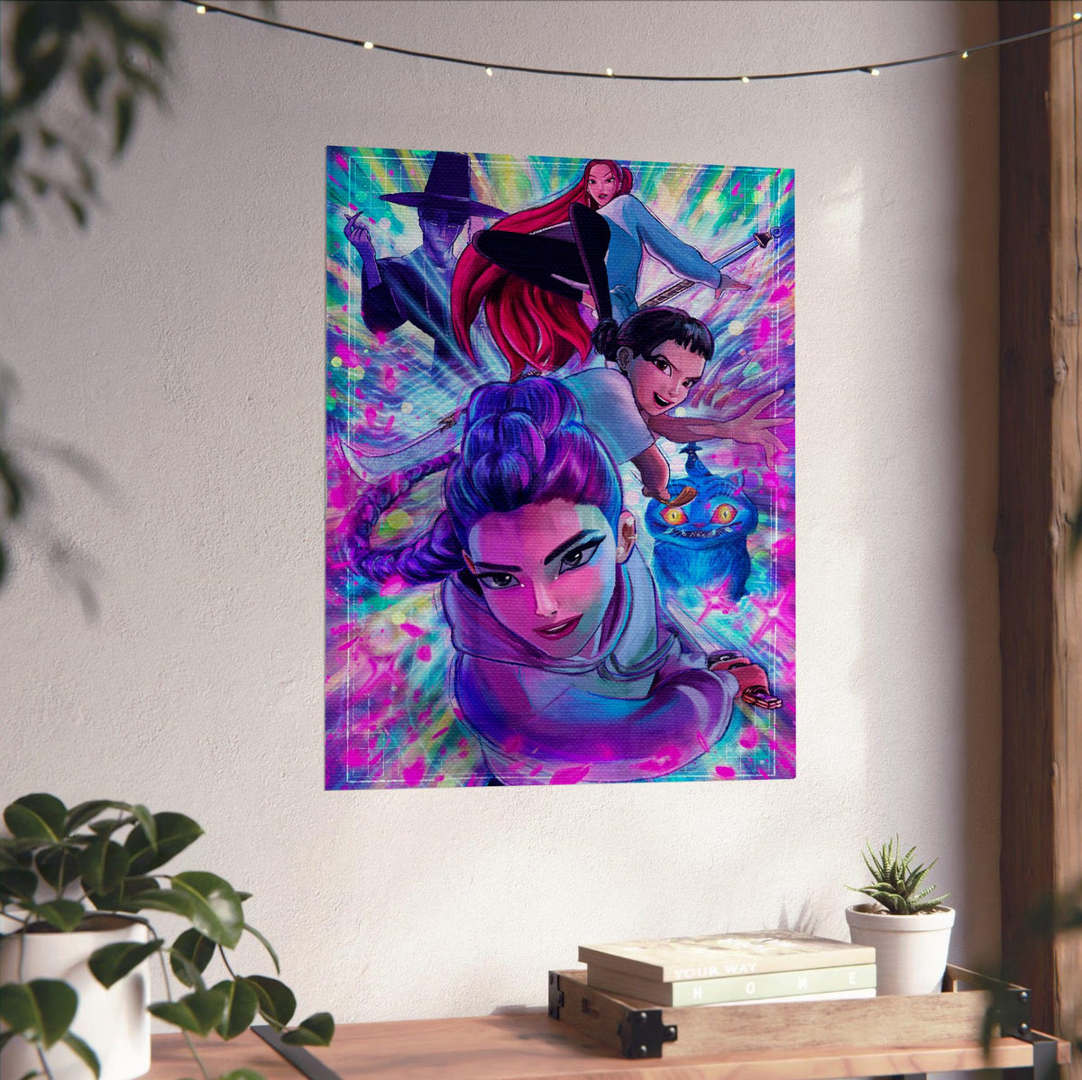 KPop Demon Hunters (2025) Movie Illustrated Character Art poster unframed on a white wall above a desk