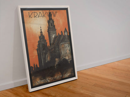 Krakow Poland poster in a white frame leaning against a wall