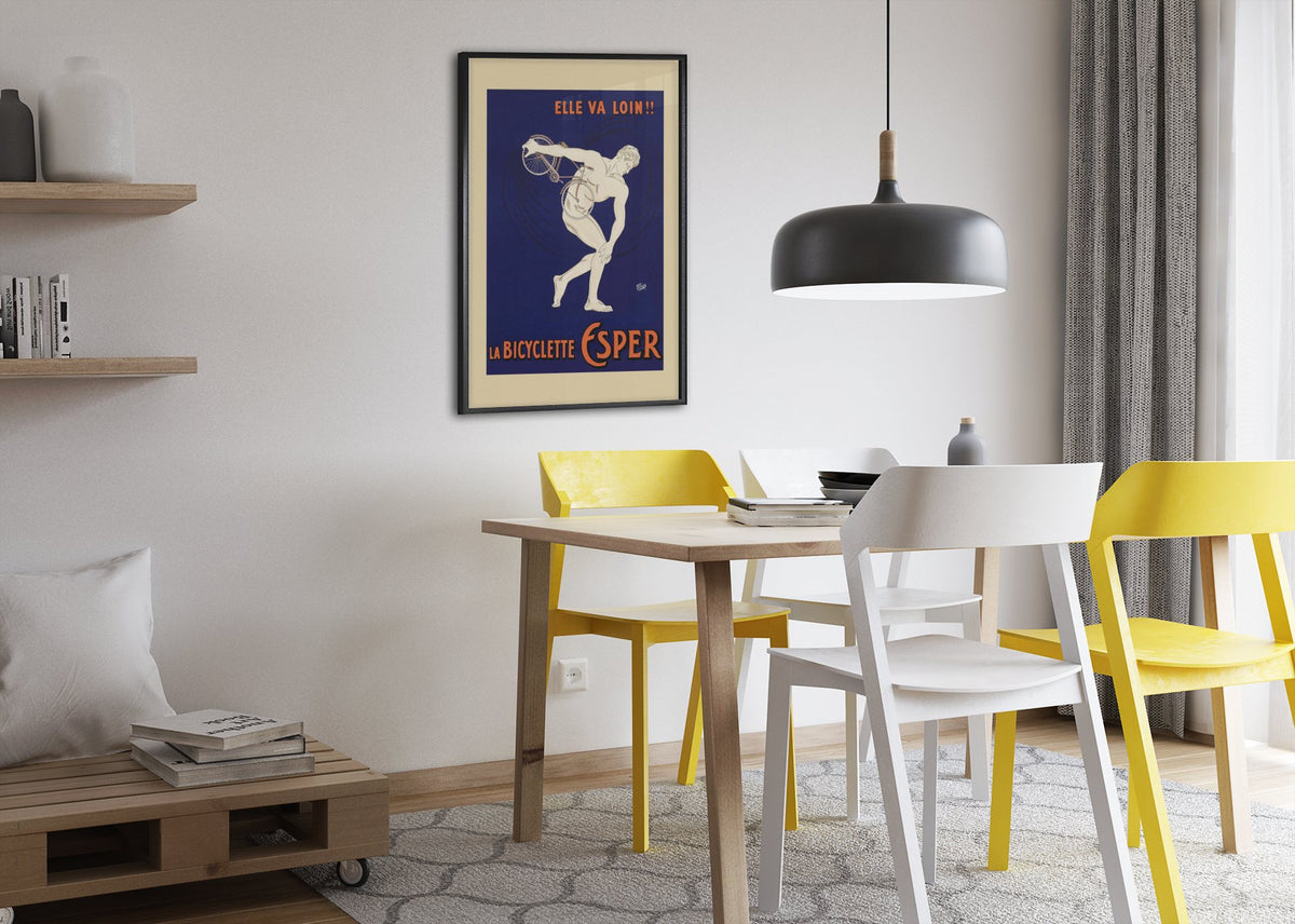 La Bicyclette Esper poster framed above a dining table
