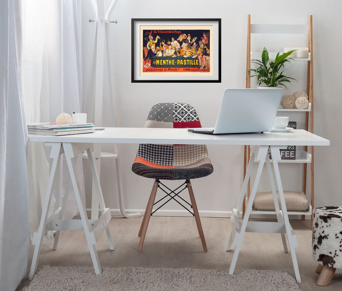 La Menthe-Pastille poster framed above a white desk in a home office