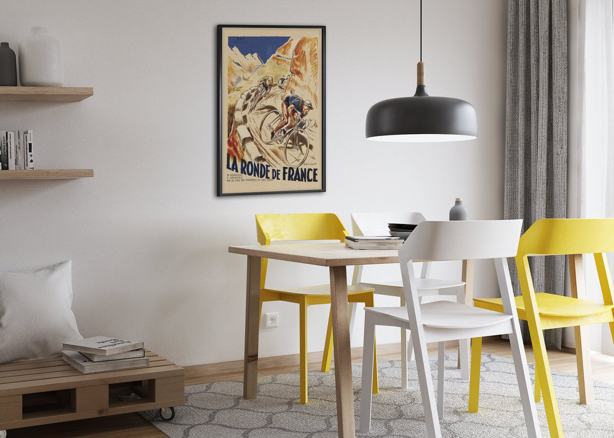 La Ronde de France poster framed above a dining table