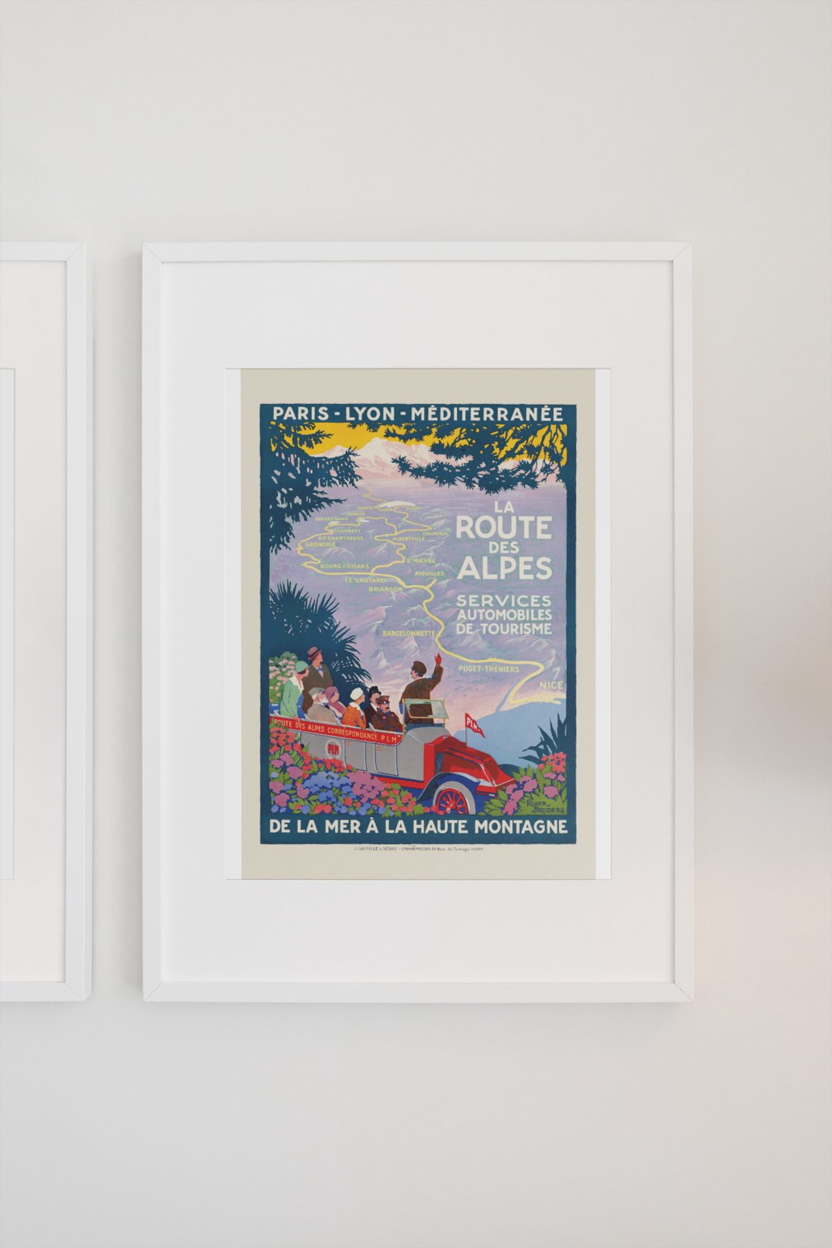 La Route des Alpes poster on a light wall