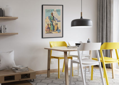 Land of Pueblos Santa Fe poster framed above a dining table