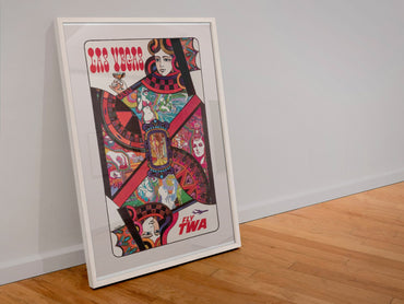 Las Vegas Fly TWA poster in a white frame leaning against a wall