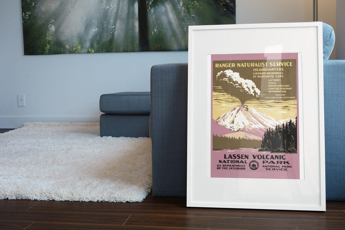 Lassen Volcanic National Park poster leaning beside a blue sofa