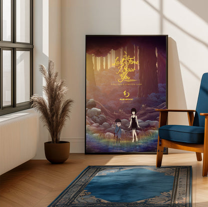 Last Time I Saw You Forest Art poster framed beside a blue armchair in a sunlit room