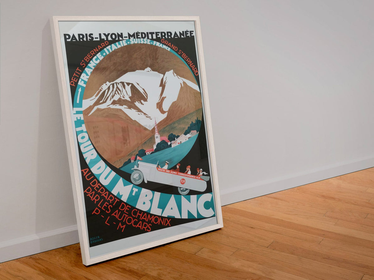 Le Tour du Mont Blanc poster in a white frame leaning against a wall