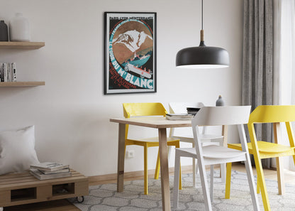 Le Tour du Mont Blanc poster leaning beside a blue sofa