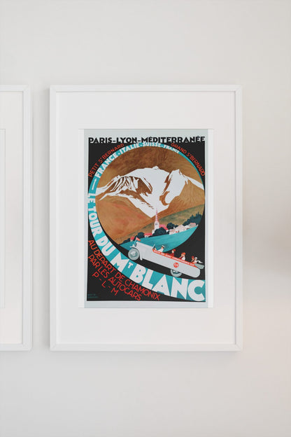 Le Tour du Mont Blanc poster framed above a dining table