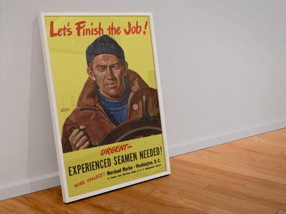 Lets Finish the Job Merchant Marine poster in a white frame leaning against a wall