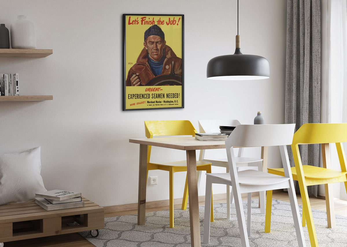 Lets Finish the Job Merchant Marine poster framed above a dining table