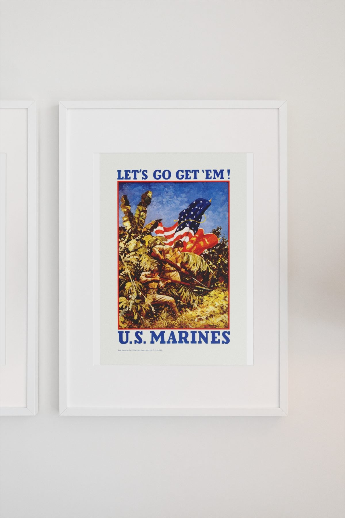 Lets Go Get Em US Marines poster on a light wall