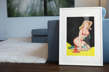 Like My Tassels poster leaning beside a blue sofa
