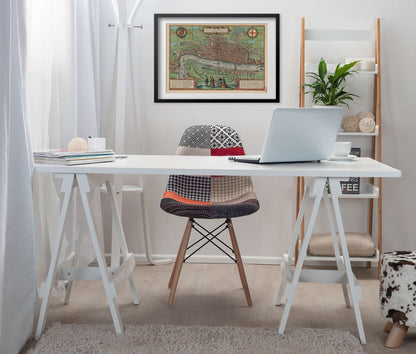 London 1561 Map print framed above a white desk in a home office