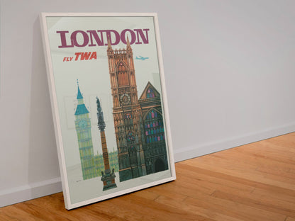 London Fly TWA poster in a white frame leaning against a wall