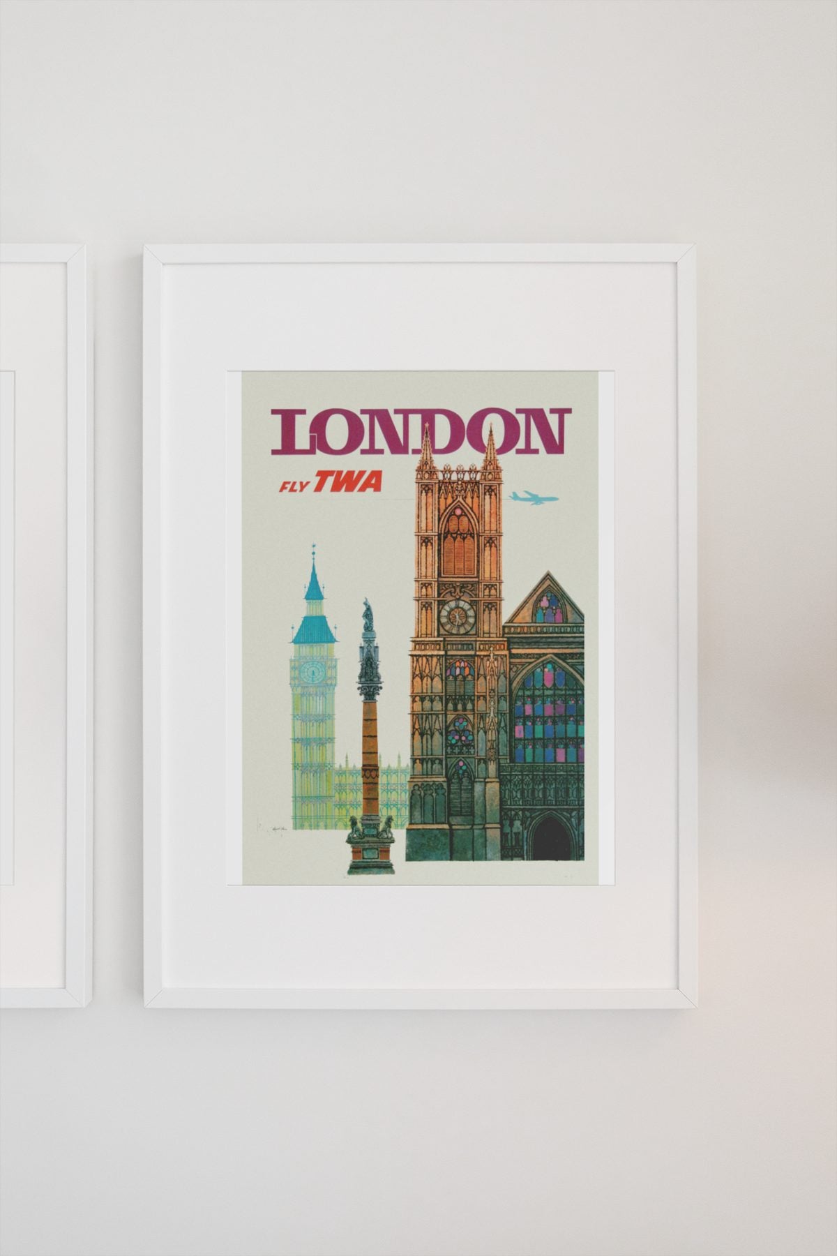 London Fly TWA poster on a light wall