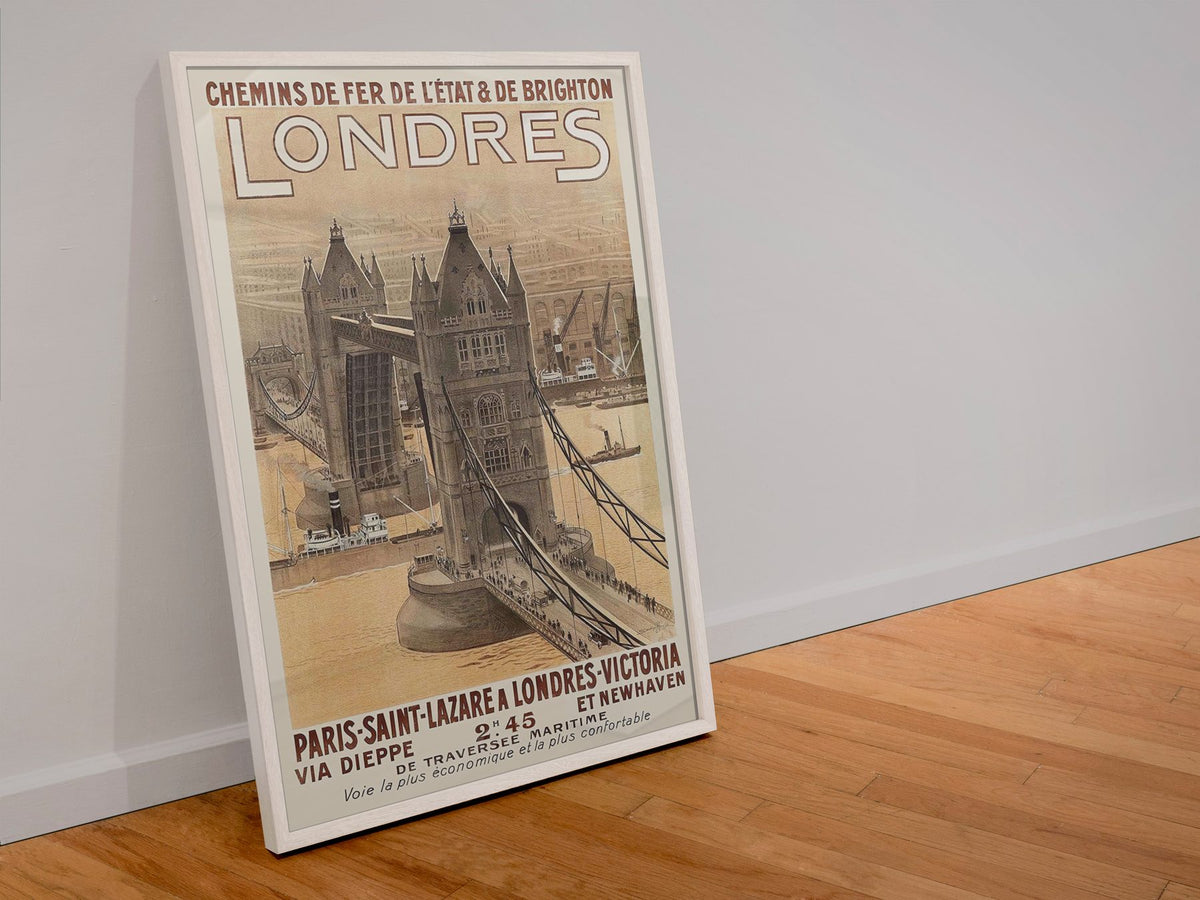 Londres Paris to London poster in a white frame leaning against a wall