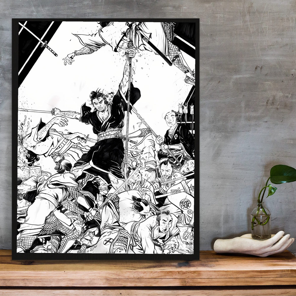 Lone Wolf and Cub: Sword of Vengeance (1972) Ink Illustration Art poster in a black frame on a wooden shelf against concrete