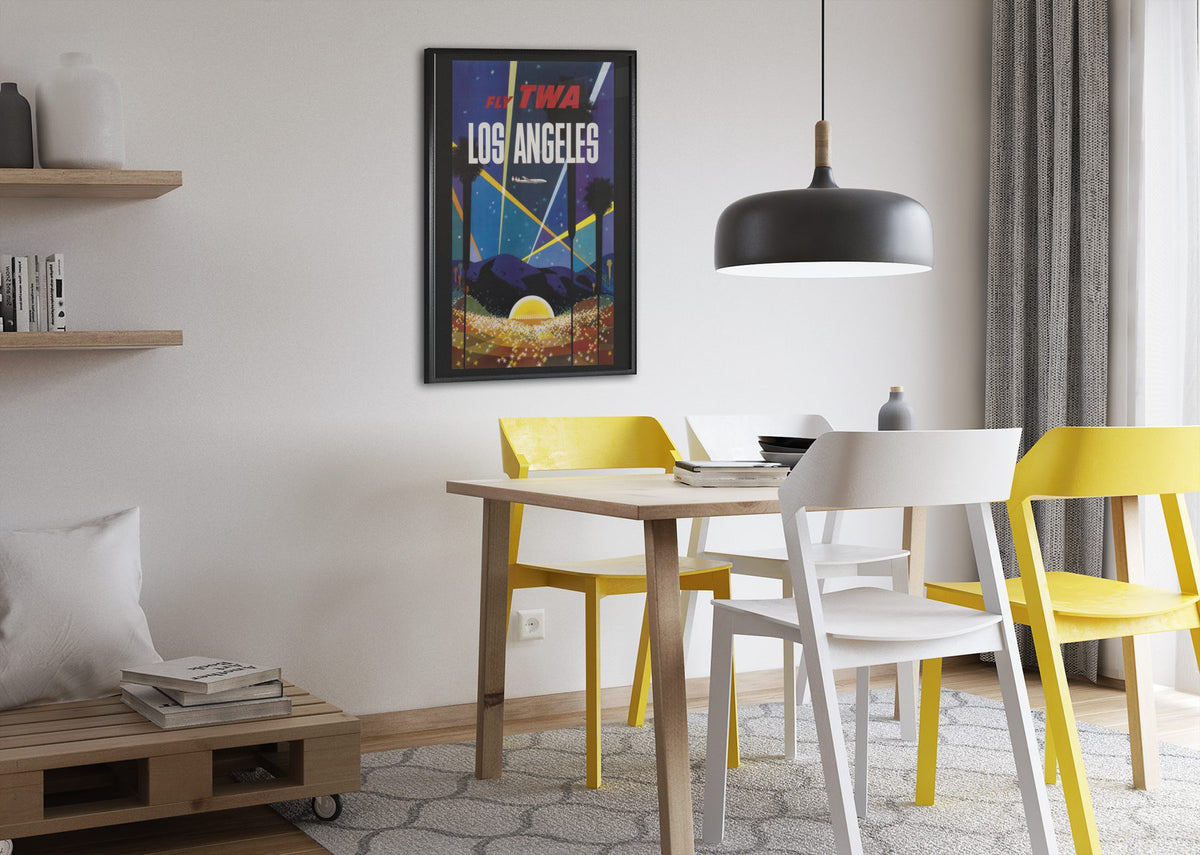 Los Angeles Fly TWA Hollywood poster framed above a dining table